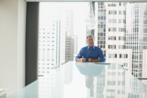 Guy sitting at table