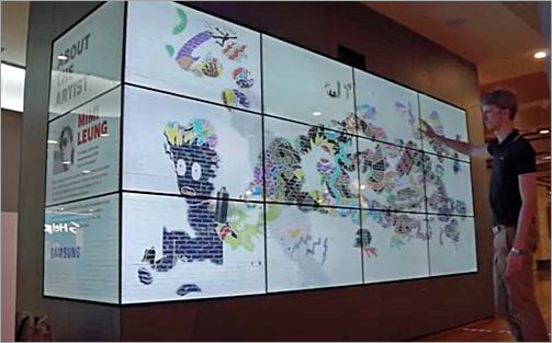 The massive, interactive graffiti wall engages potential customers and helps cement the sponsor's image as a tech innovator.