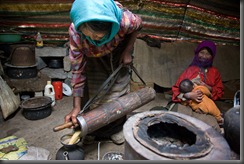 Manzong pouring the yak butter tea—a nutritional staple. 