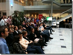 Employees listening to Gordon Frazer